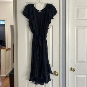 Fun & flirty mid calf Max Studio dress.  Black with gray stars.